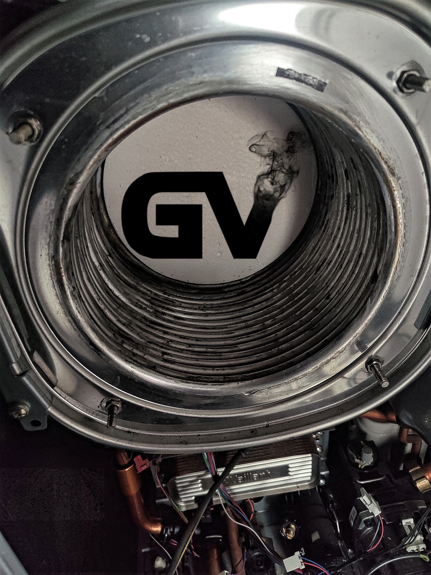 Close-up of a boiler flue and heat exchanger during a Gas Vortex service.
